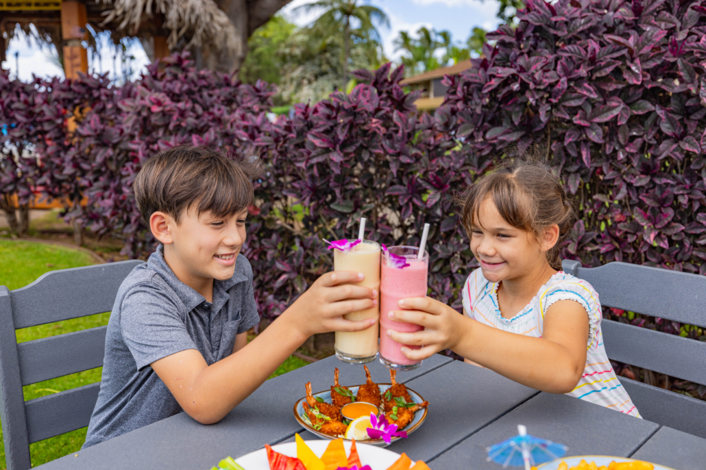 Castaway Cafe kids holding smoothies